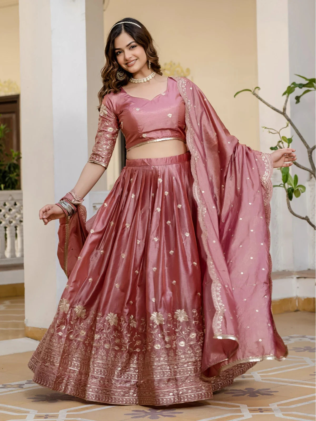 Tarani rose pink gold crush lehenga front view showing flare and embroidery