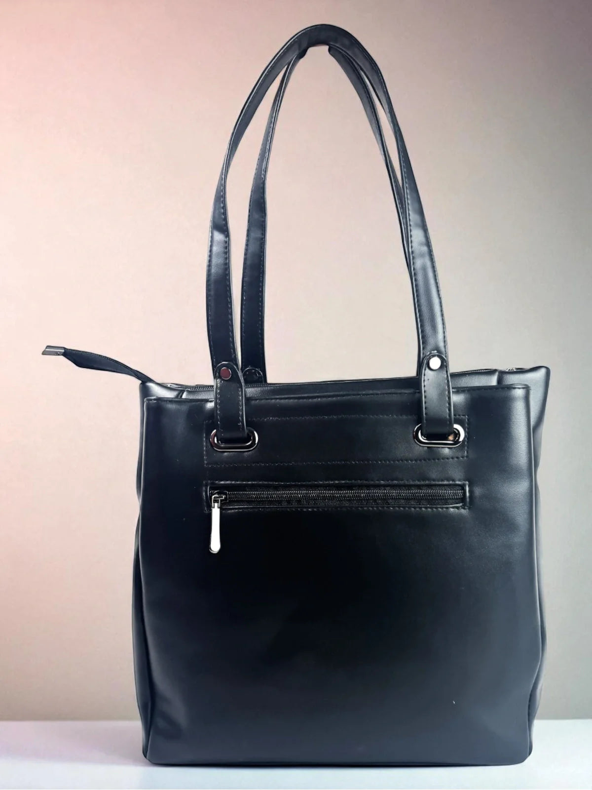 Tarani black PU leather handbag plain back with zipper pocket view