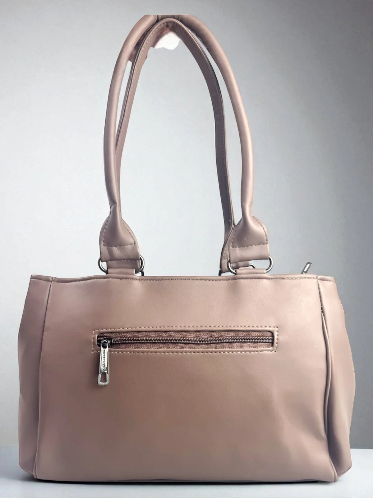 Tarani brown PU leather handbag back view with zipper