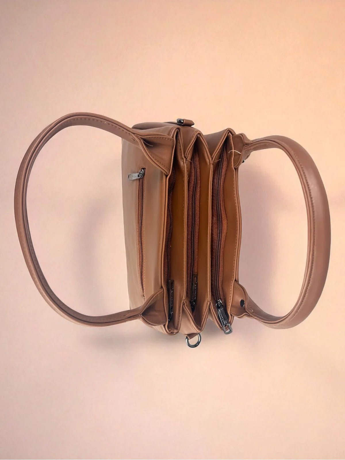 Tarani brown PU leather handbag top view showing spacious compartments