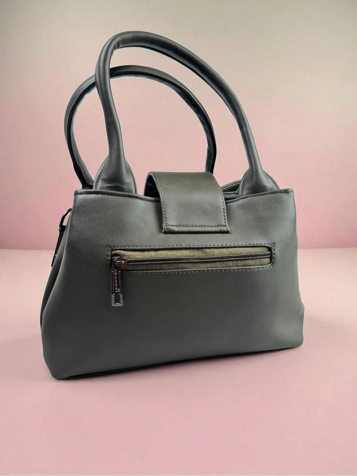 Tarani PU leather handbag back view with zipper pocket in dark green