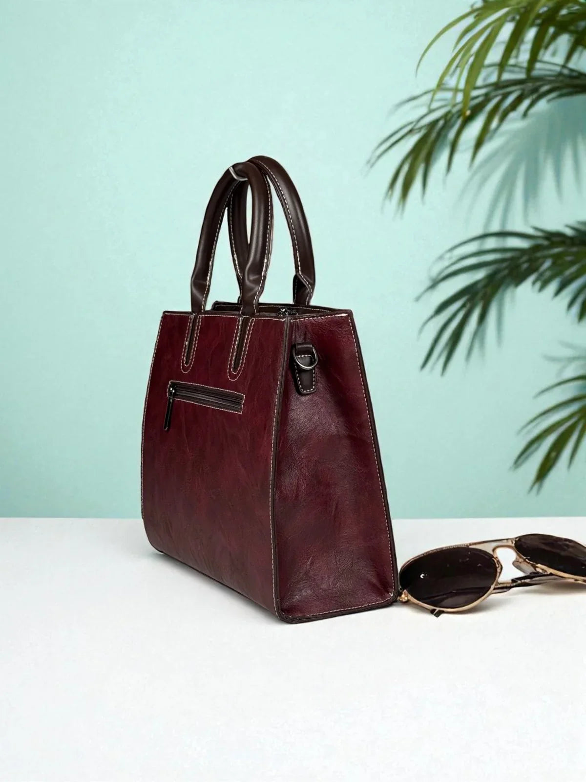 Tarani PU leather maroon handbag stylish side profile view premium look