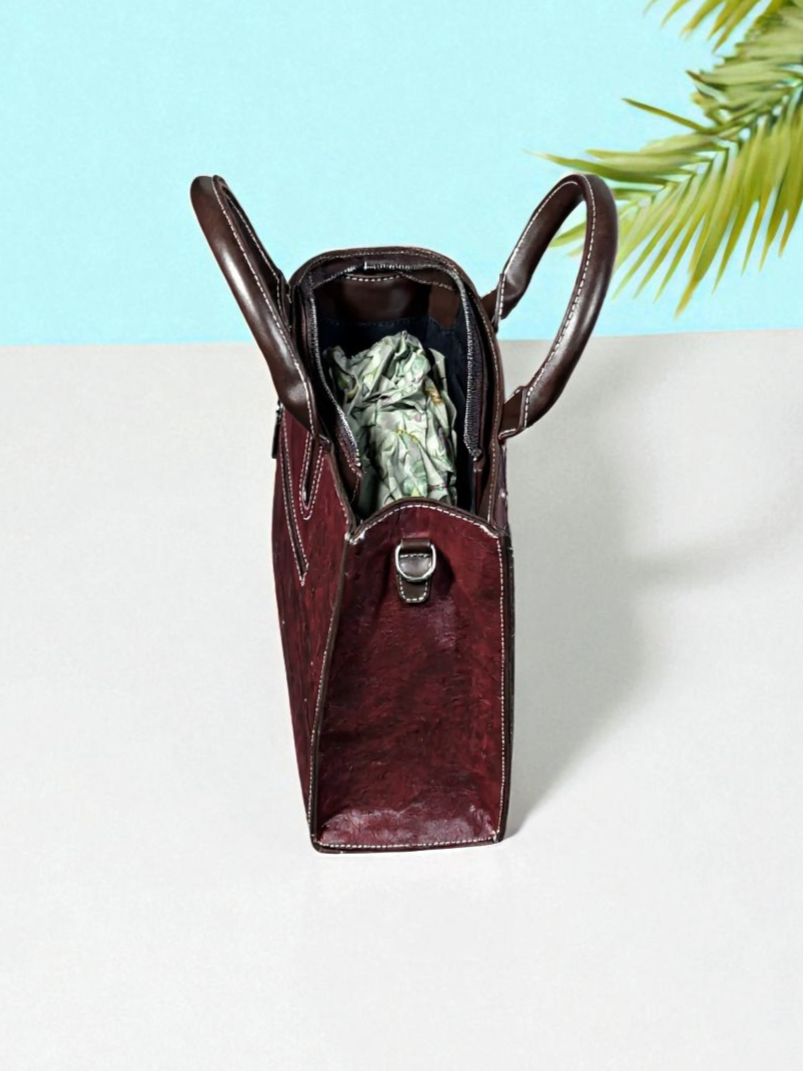 Tarani PU leather maroon handbag top view spacious interior with compartments