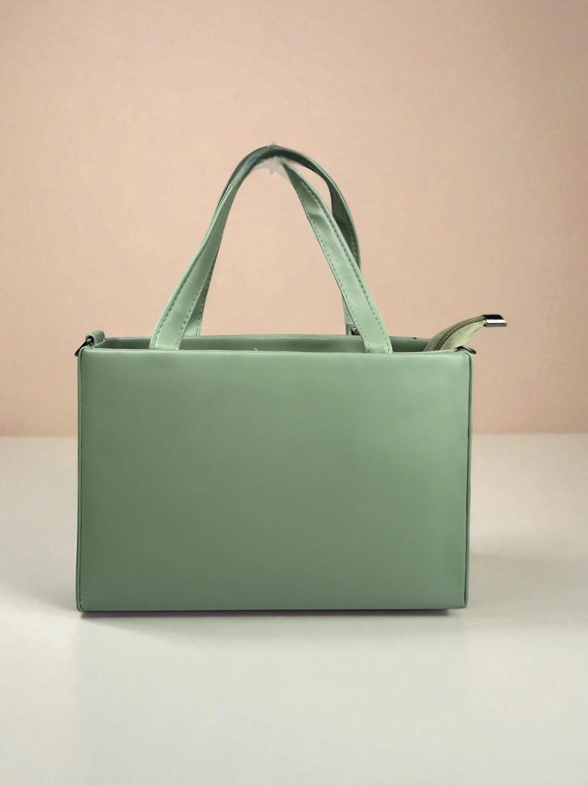 Tarani handbag in pu-leather mint green back view premium elegant bag