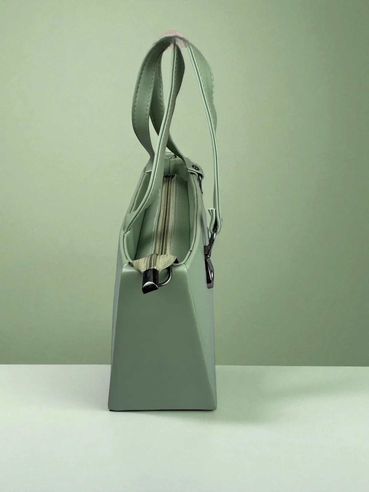 Tarani handbag in pu-leather mint green side view stylish and durable