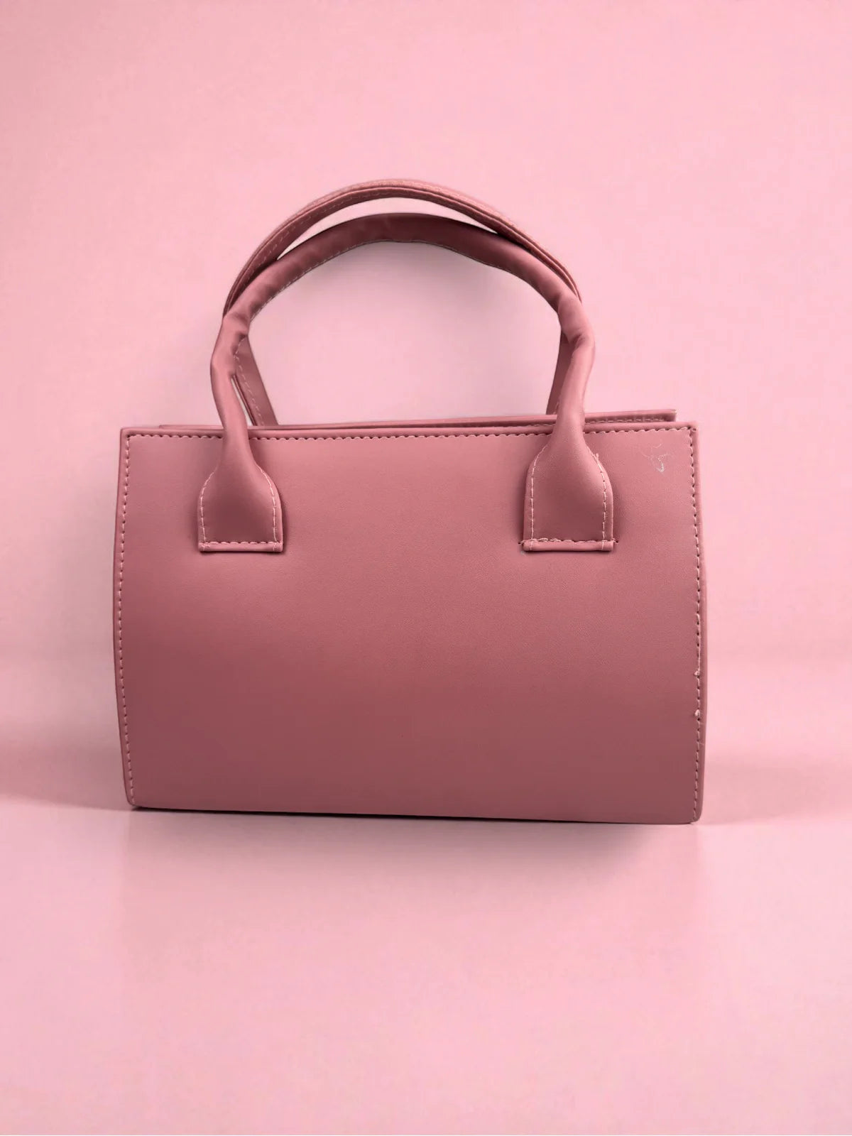 Tarani pink PU leather handbag minimal back view