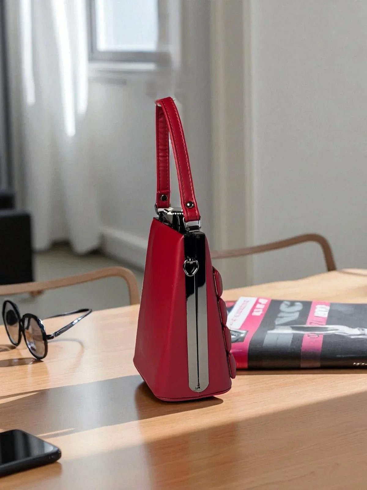 Tarani red PU leather designer handbag side view