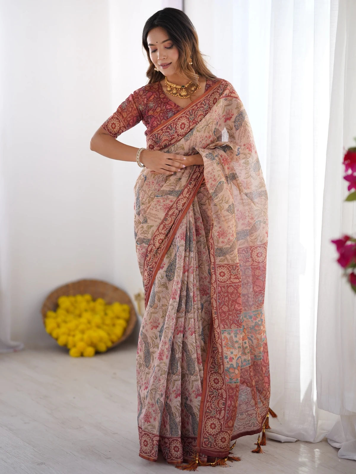 Tarani Vaishvika premium handloom beige floral saree full view with tassels and blouse piece