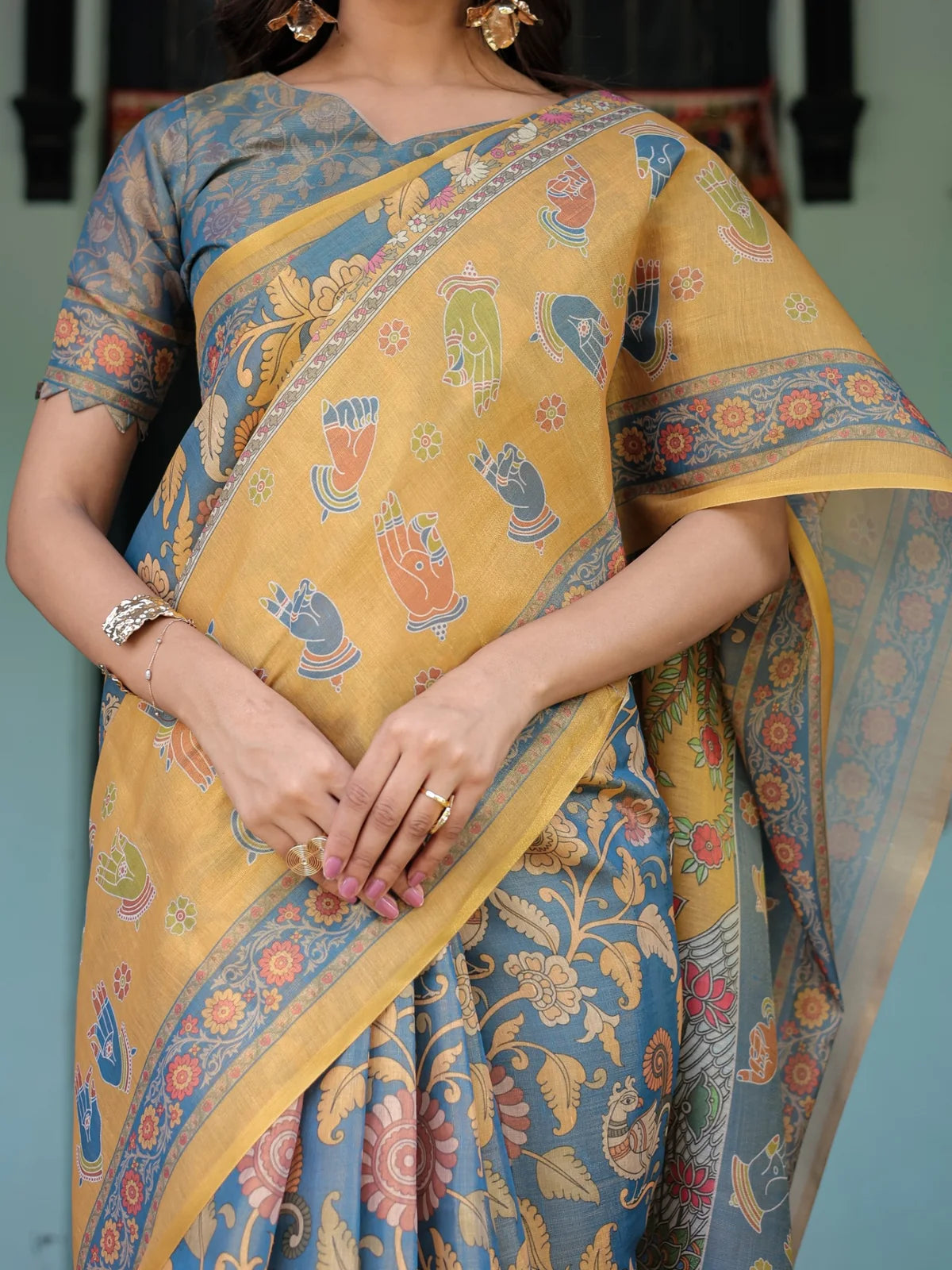 Tarani Hemashri premium handloom saree closeup showing floral motifs border and heritage details