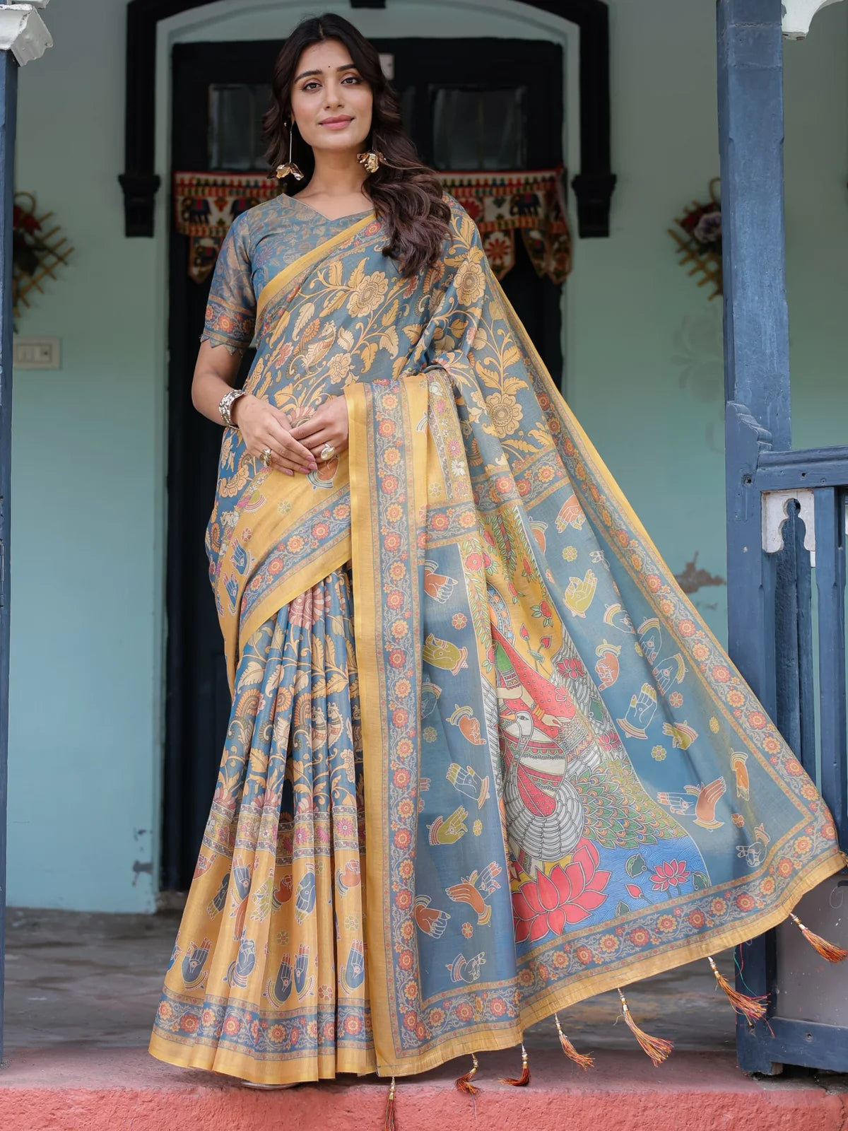 Tarani Hemashri premium handloom grey saree full view with floral motifs tassel pallu and blouse piece