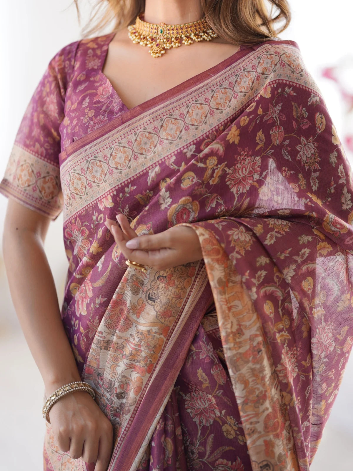 Tarani premium floral handloom saree closeup view showing border and pallu detailing