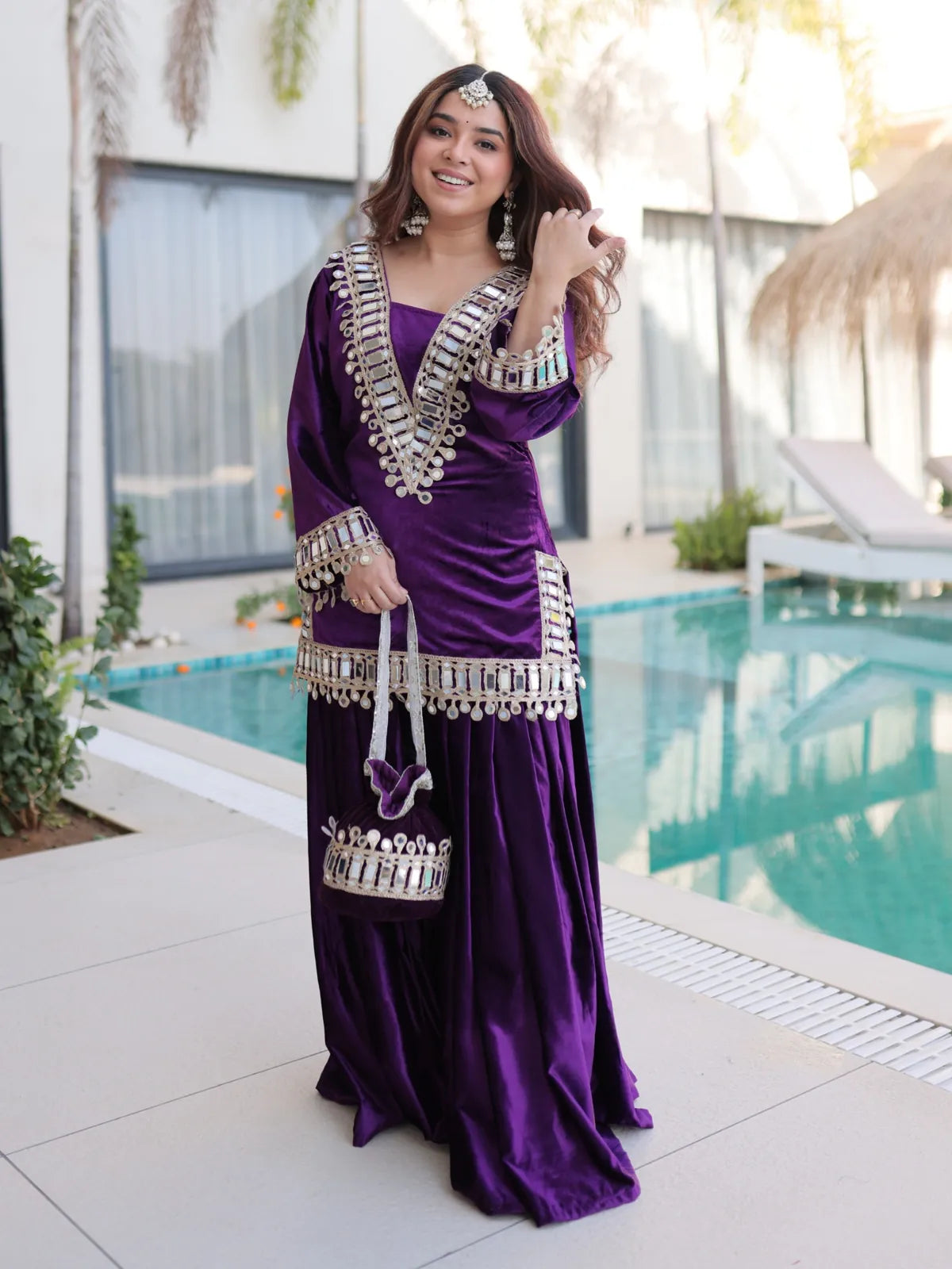 Tarani premium purple ice velvet dress with mirror work embroidery front view for festive occasions