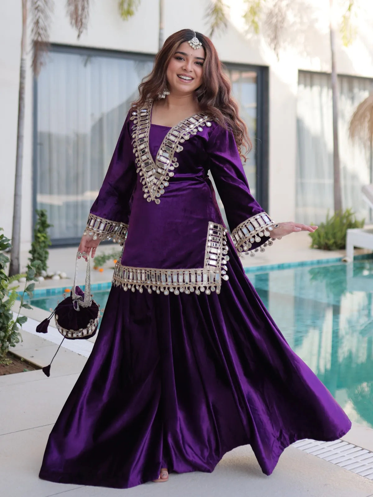 Tarani full view of purple embroidered ice velvet dress with flared silhouette for cultural events