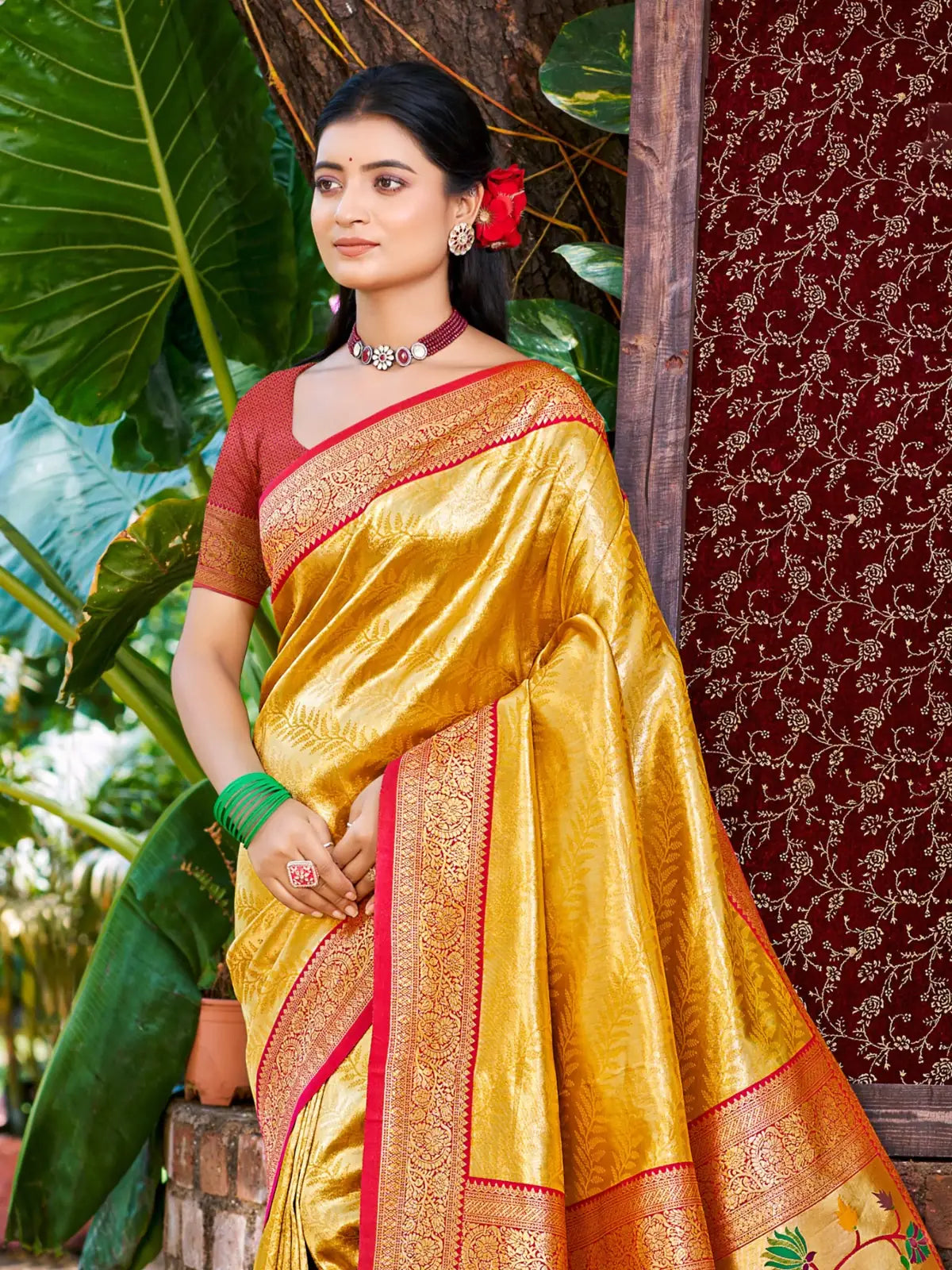 Tarani yellow Kanjivaram silk saree front view with zari border and festive style