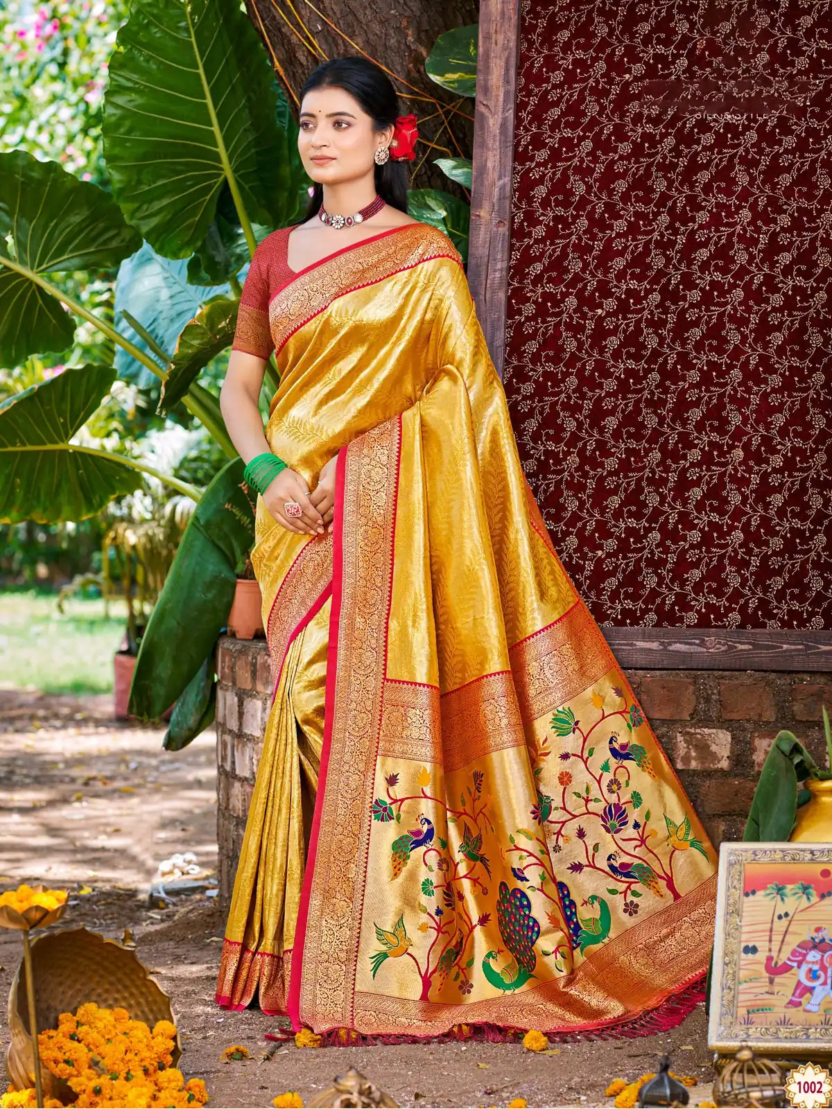 Tarani yellow Kanjivaram silk saree full view with traditional woven pallu and blouse piece