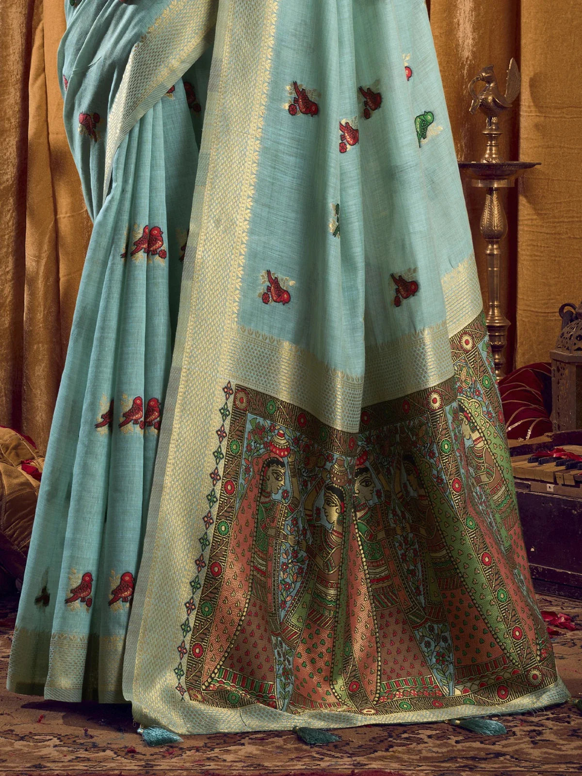 Tarani khadi cotton light blue saree with artistic pallu design in traditional madhubani artwork