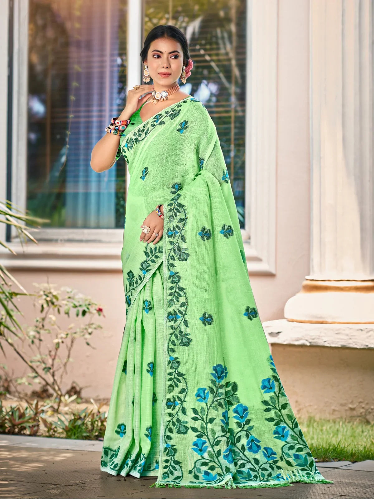 Tarani light green Lilen festive saree full view with elegant floral design