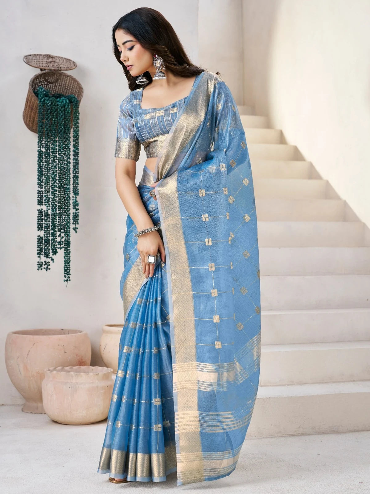 Tarani Mokshita blue linen cotton silk saree with zari work side view