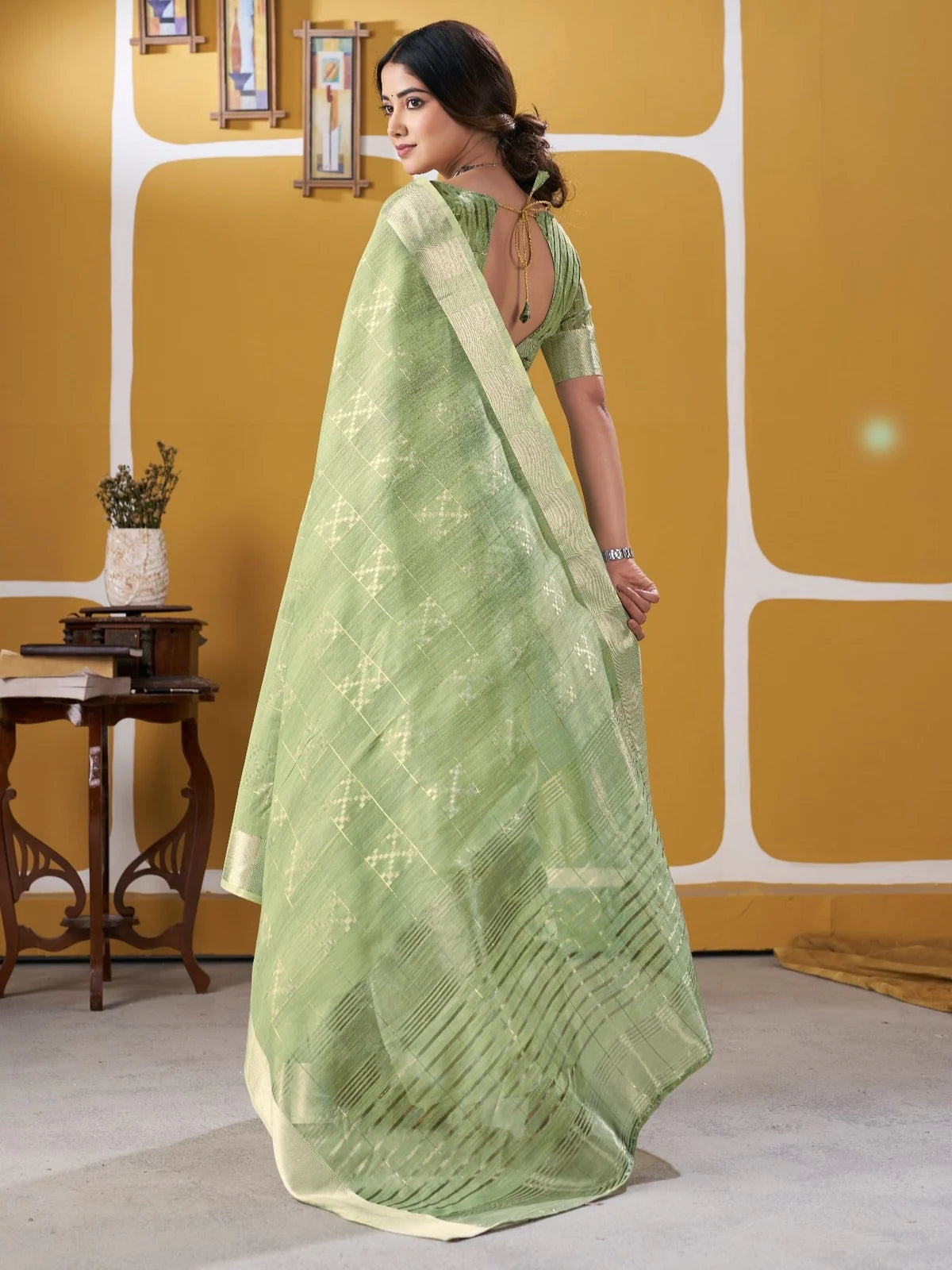 Tarani green soft linan cotton silk saree elegant back view