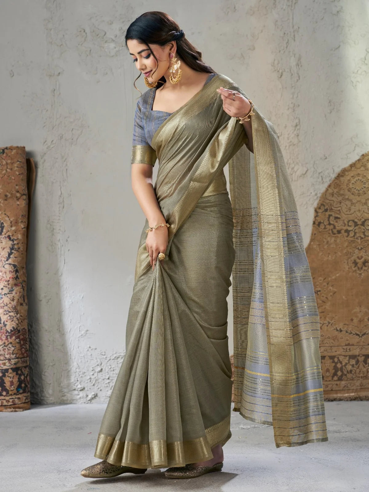 Tarani Neelashri party wear olive green linen cotton silk saree front drape view