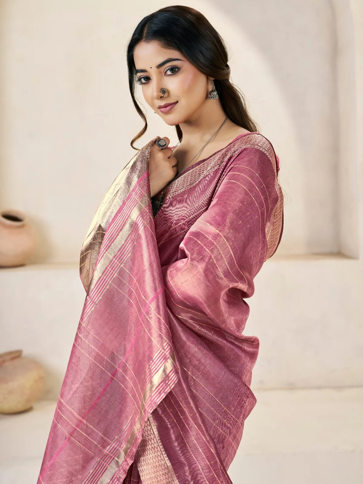 Tarani Garvita pink linen cotton silk saree pallu view with rich zari border