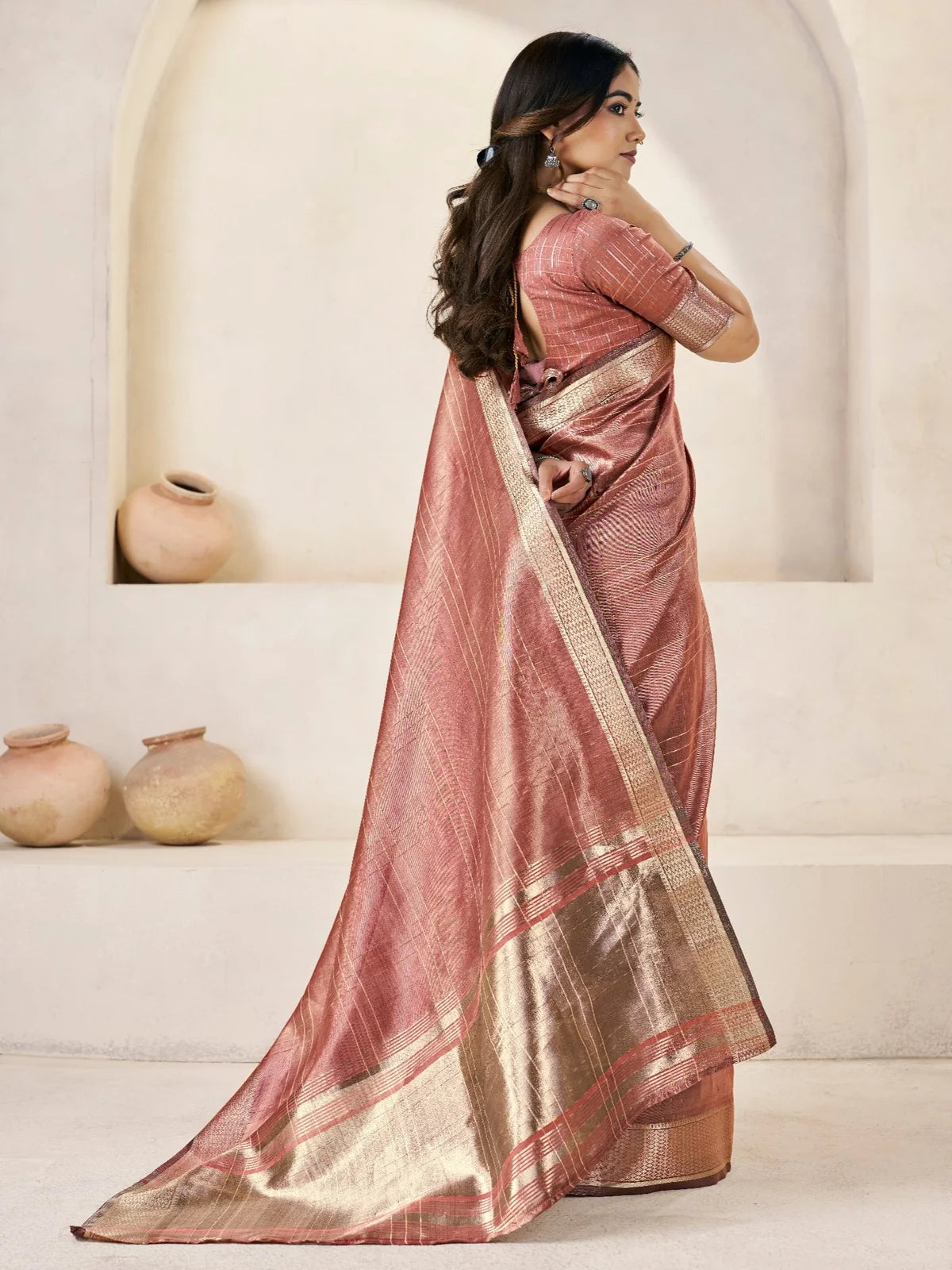 Tarani Amala rose pink soft linan cotton silk saree back view with flowing drape