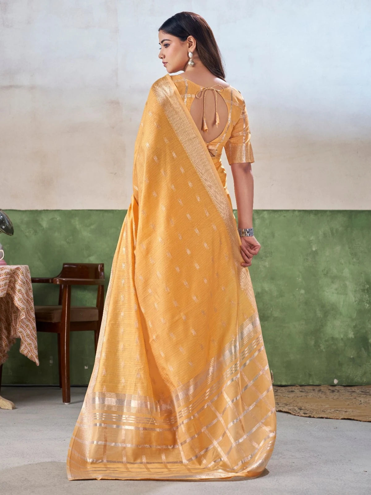 Tarani yellow linen cotton silk saree back view with designer blouse pattern and woven pallu