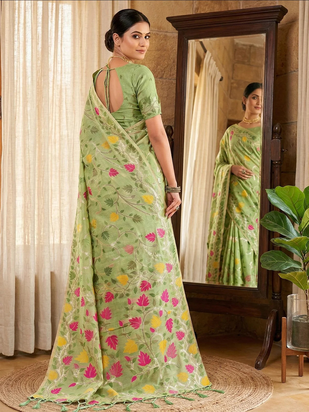 Tarani Gunjita green Linen Cotton saree back view with blouse pattern and floral pallu