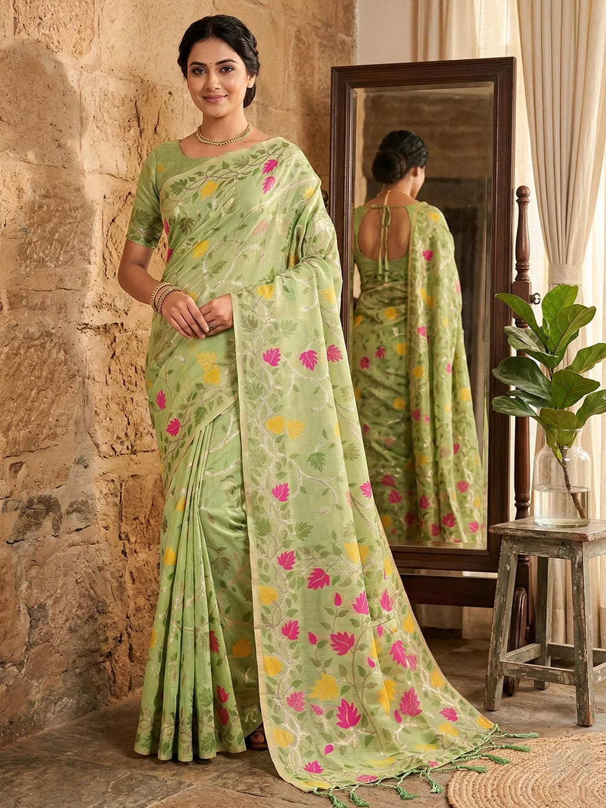 Tarani Gunjita green Linen Cotton saree front view with floral motifs and elegant drape