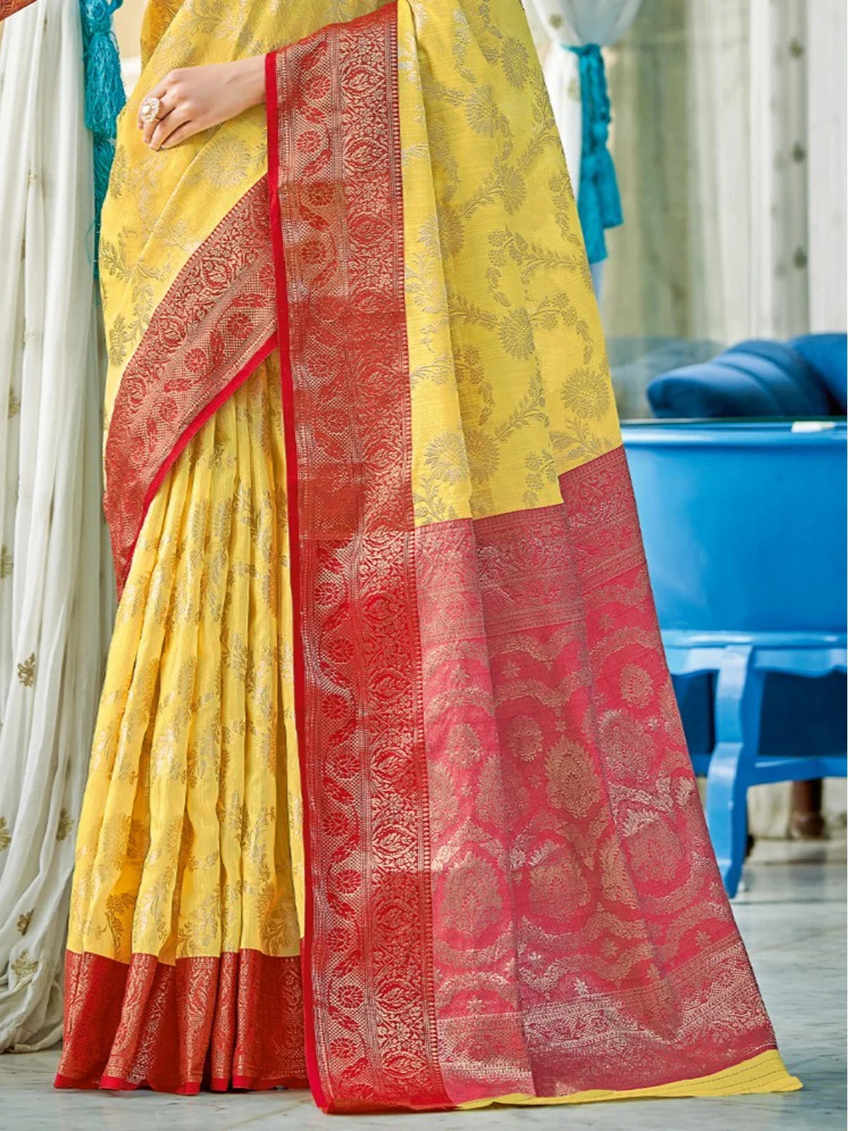 Tarani yellow linen cotton saree detailed red pallu and border view for festive wear