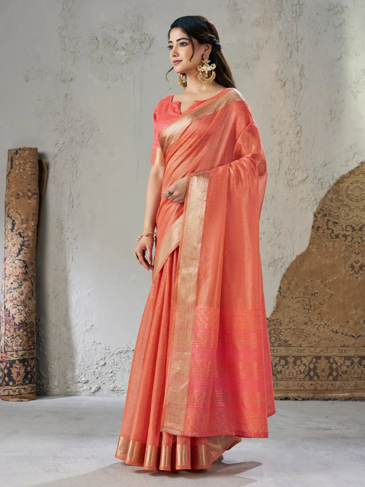 Tarani Mihika peach linen cotton silk saree elegant side drape view with zari border