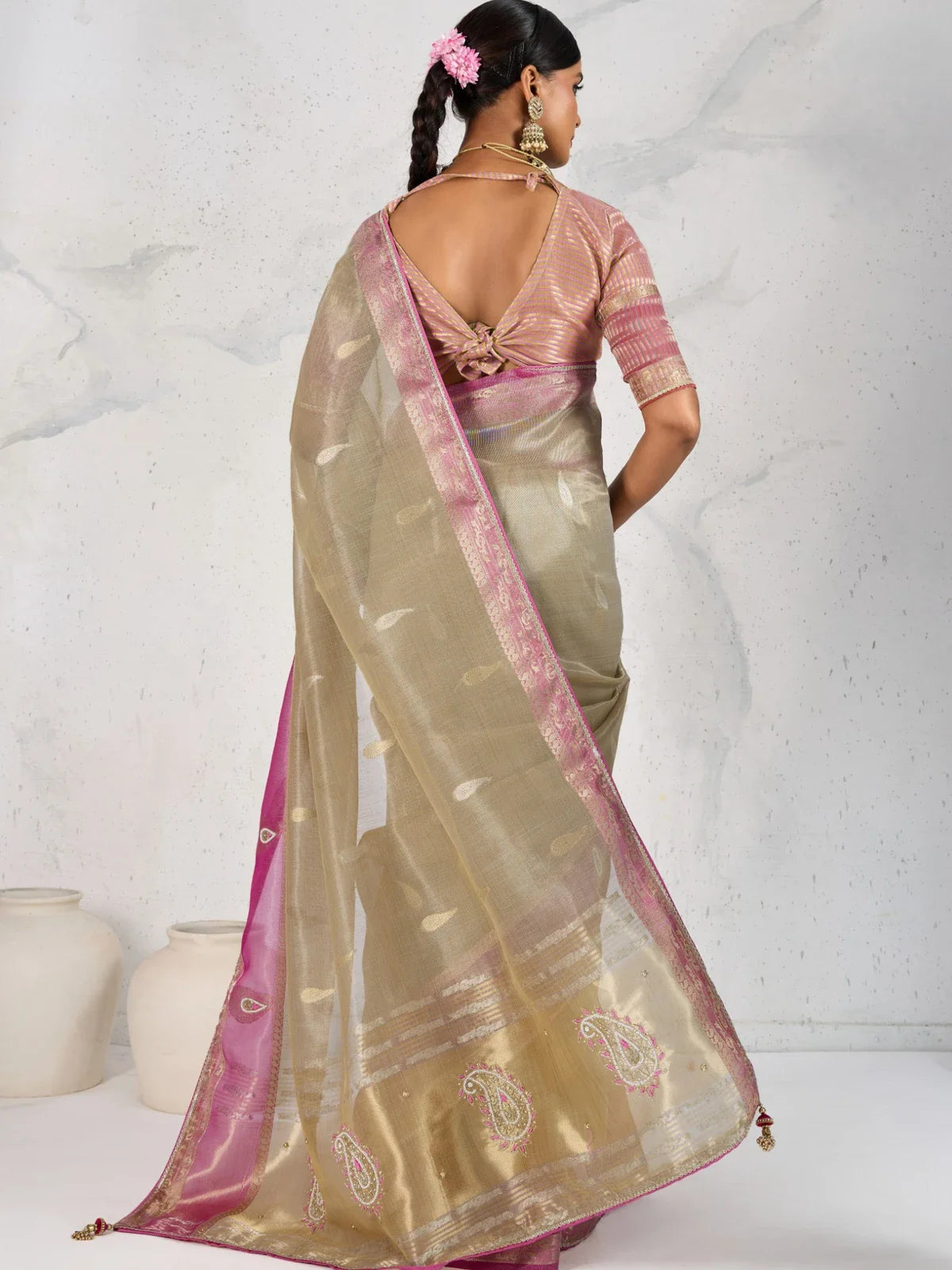 Tarani beige linen saree back view showing pallu design and contrast blouse style