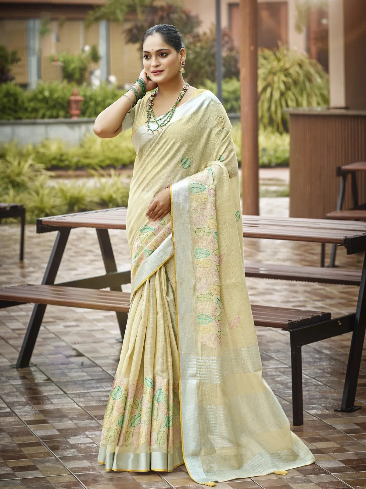 Tarani beige linen saree full view with pastel leaf embroidery and blouse piece