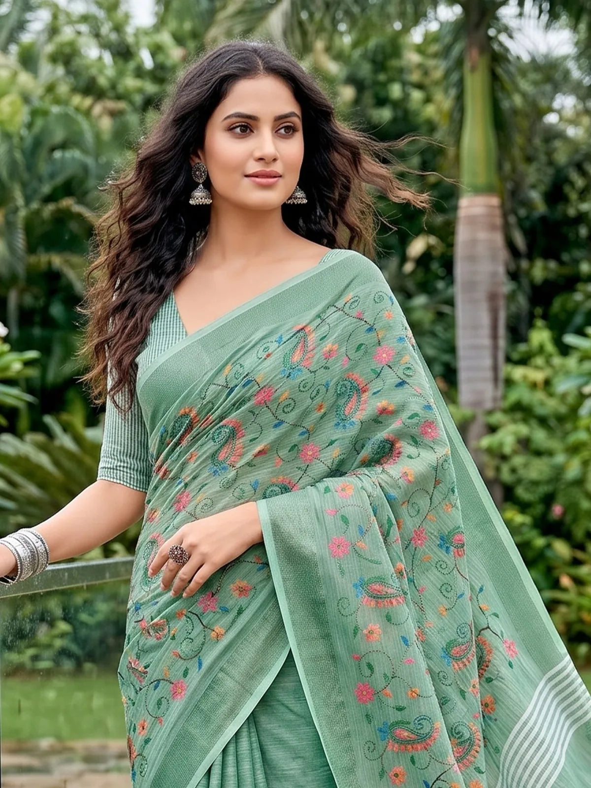 Tarani green linen saree upper body view showing Kashmiri embroidery details