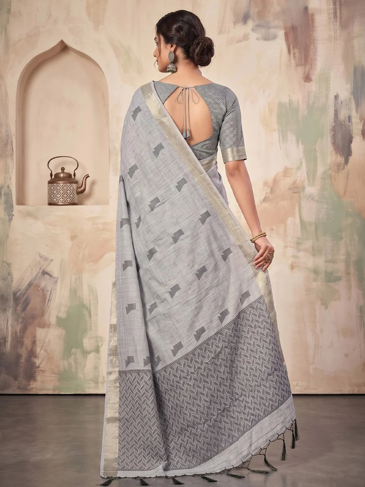 Tarani grey linen cotton saree back view with woven pallu and tassel