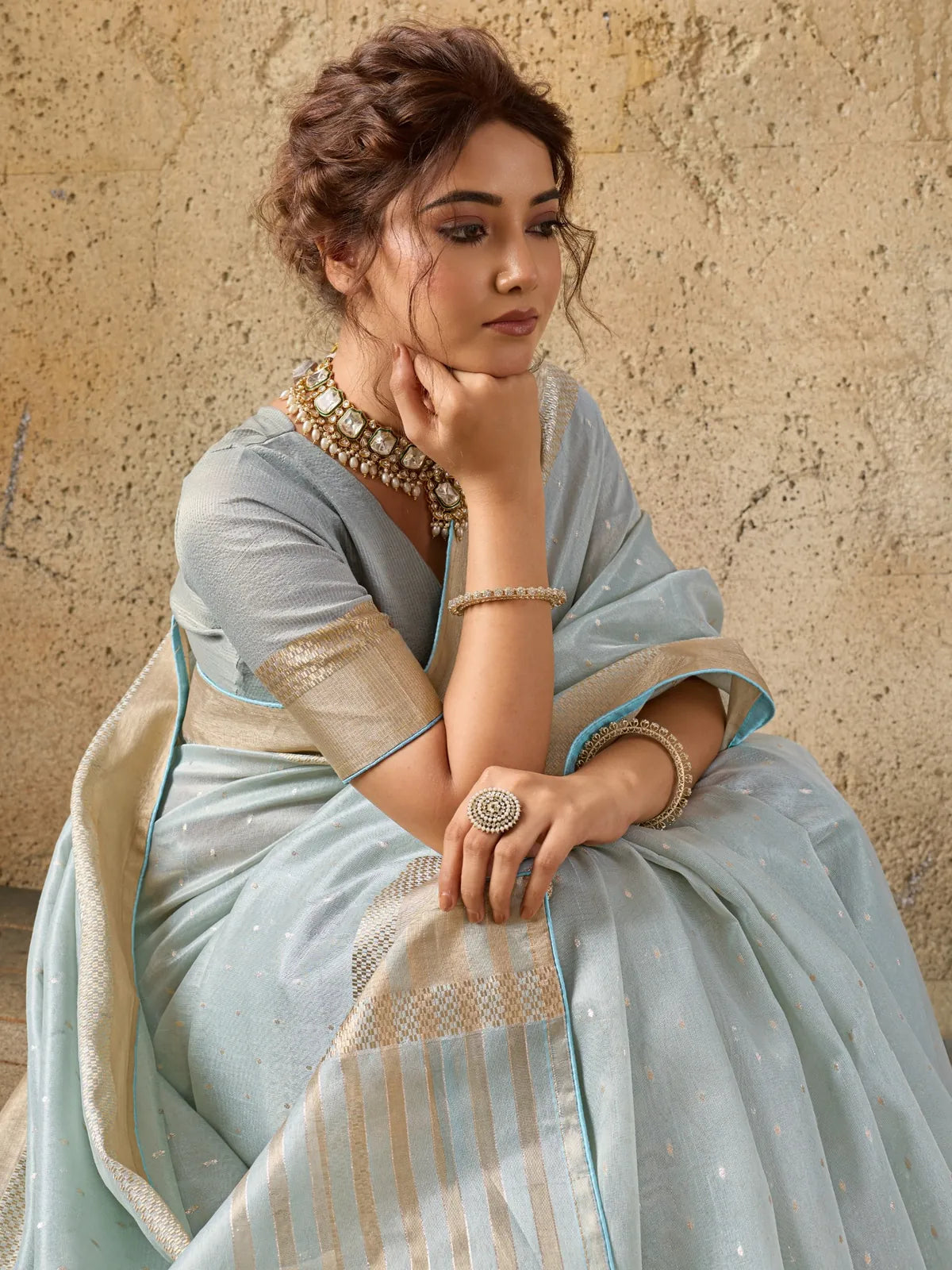 Tarani light blue Tissue Linen saree closeup showing zari detailing