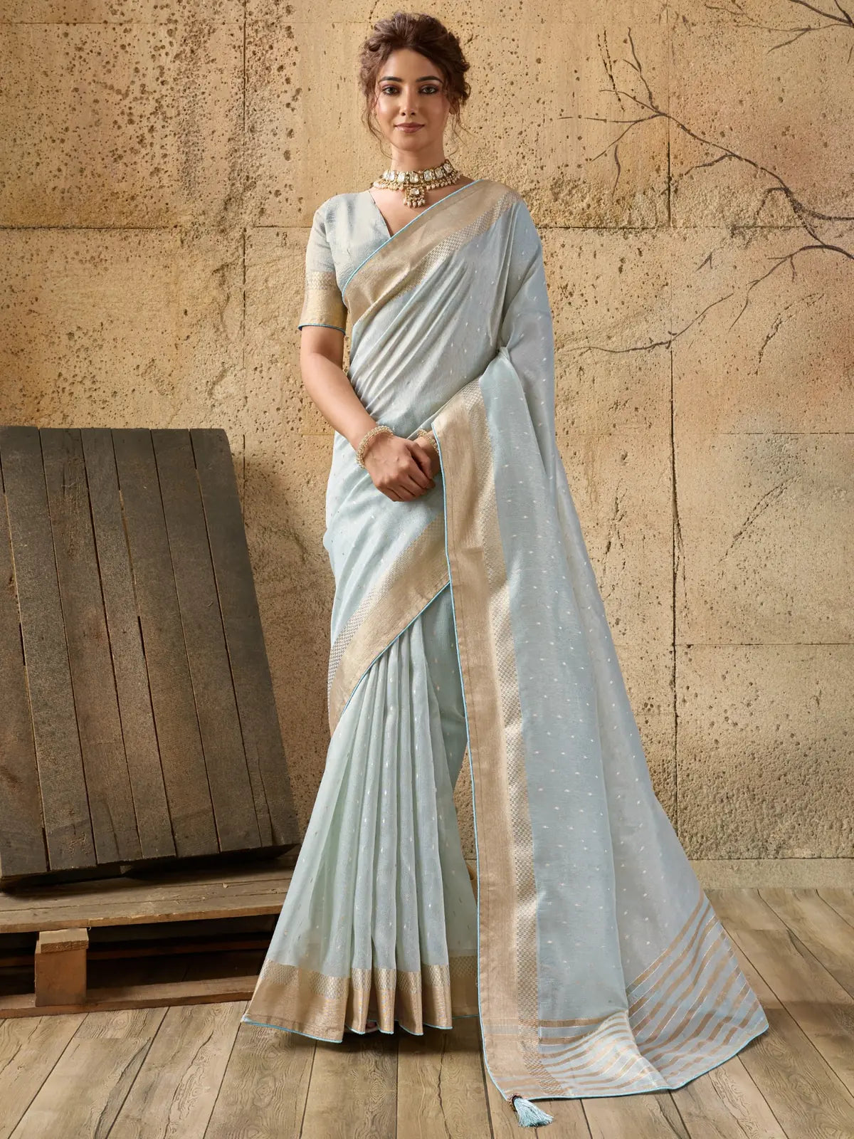 Tarani light blue Tissue Linen saree full view with zari motifs and woven blouse