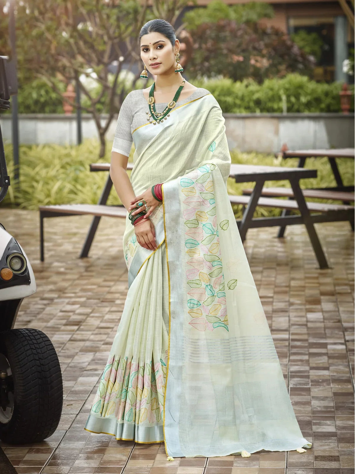Tarani light green linen saree with pastel leaf embroidery and matching blouse full view