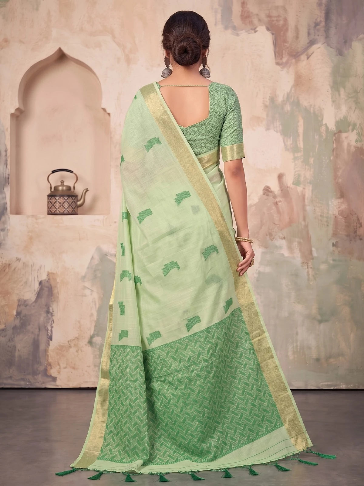 Tarani mint green linen cotton saree back view showing pallu and blouse