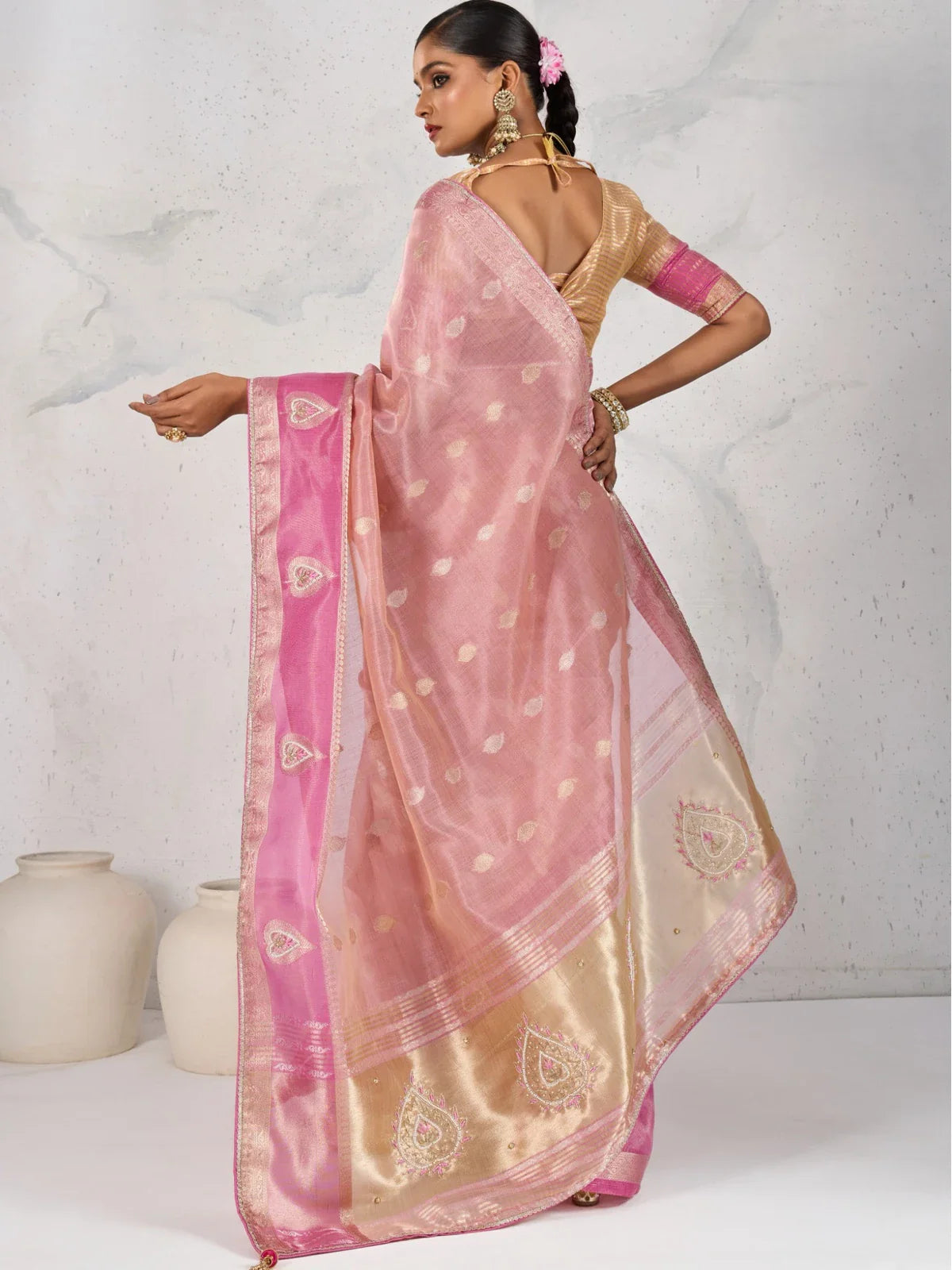 Tarani pink linen saree with zari woven butta back-view and handwork blouse
