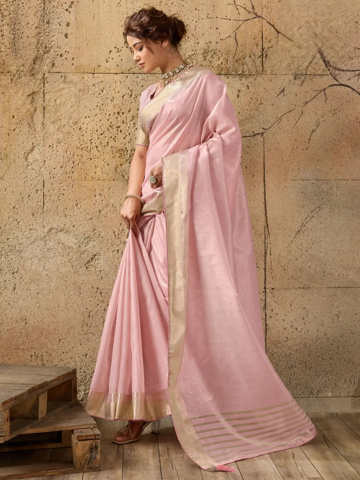 Tarani pink Tissue Linen saree side view showing elegant drape and zari patta border