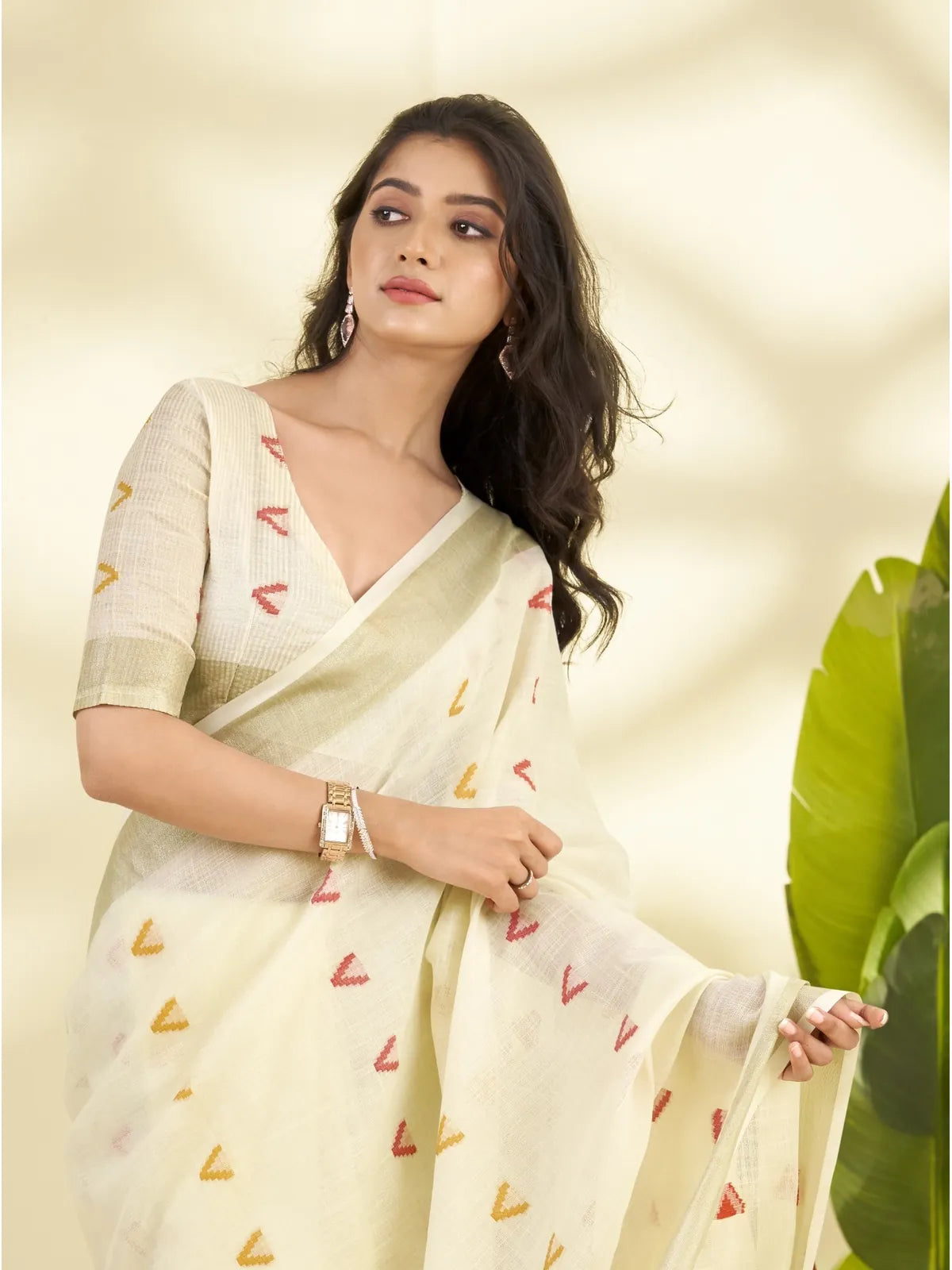 Tarani premium off white linen silk saree with zari border upper body pose showing blouse and pallu