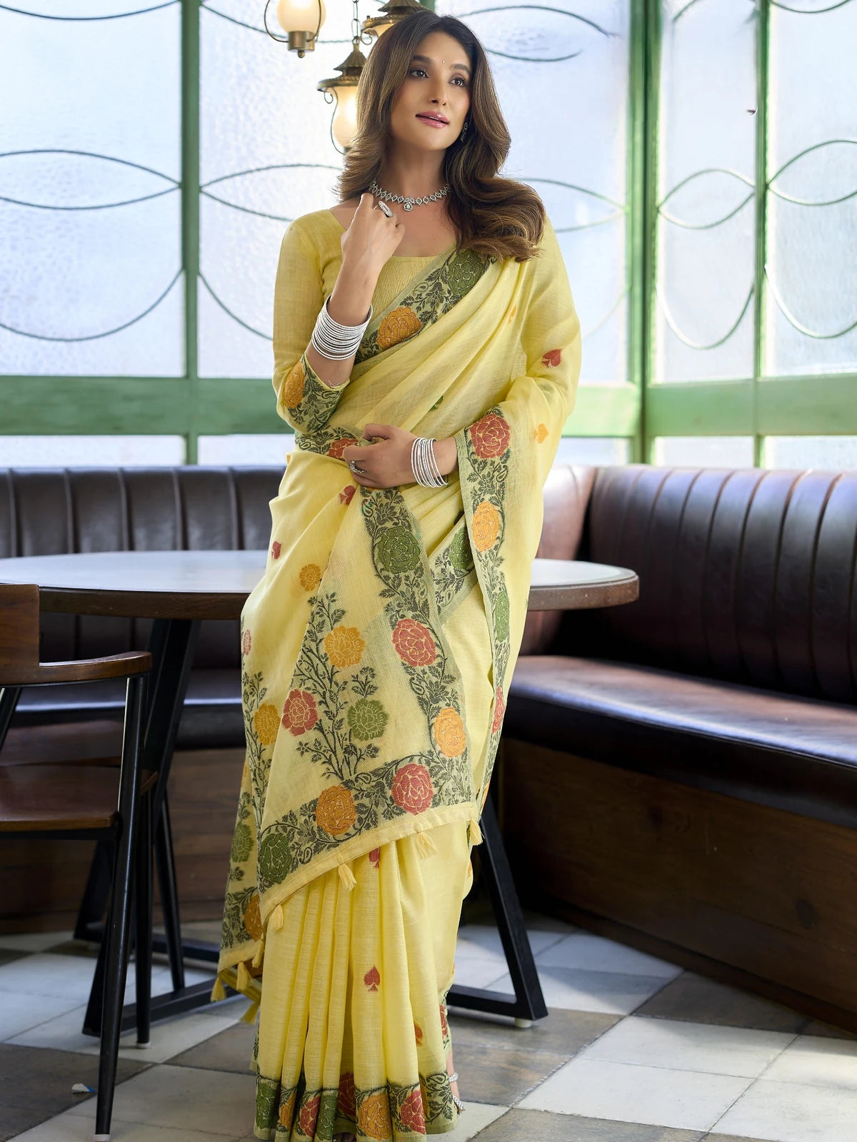 Tarani yellow floral woven linen saree front view with elegant festive drape for women