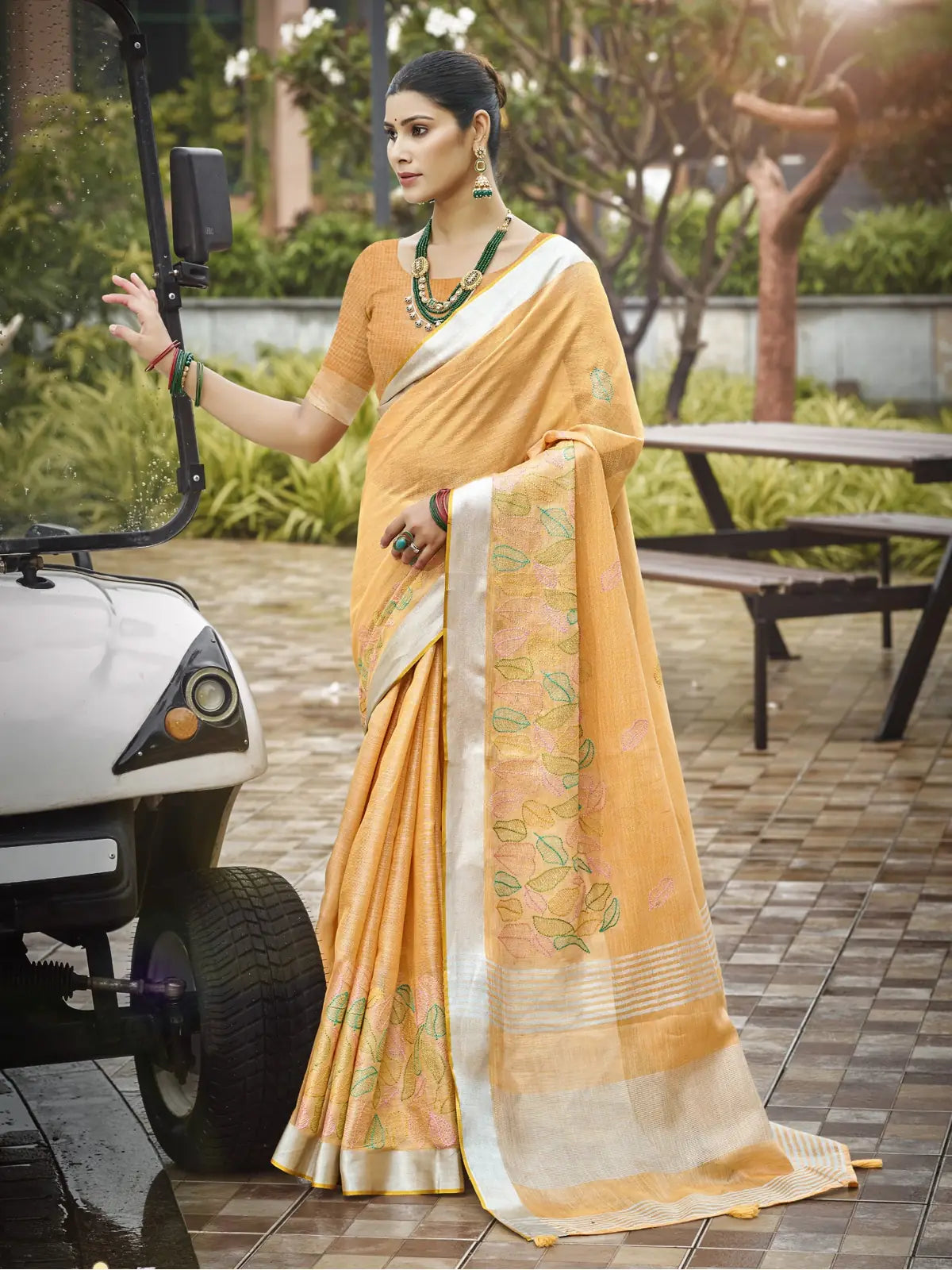 Tarani yellow linen saree full view with matching blouse perfect for festive wear