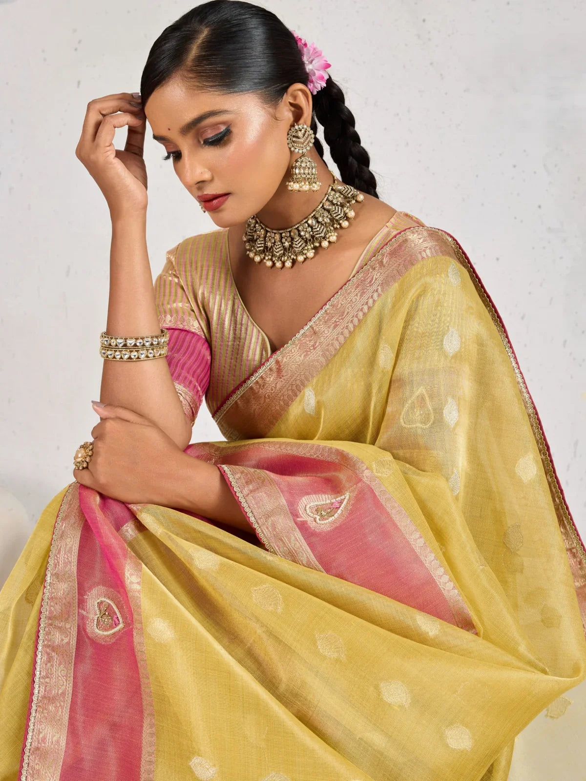 Tarani yellow linen saree upper body view with blouse and jewelry styling