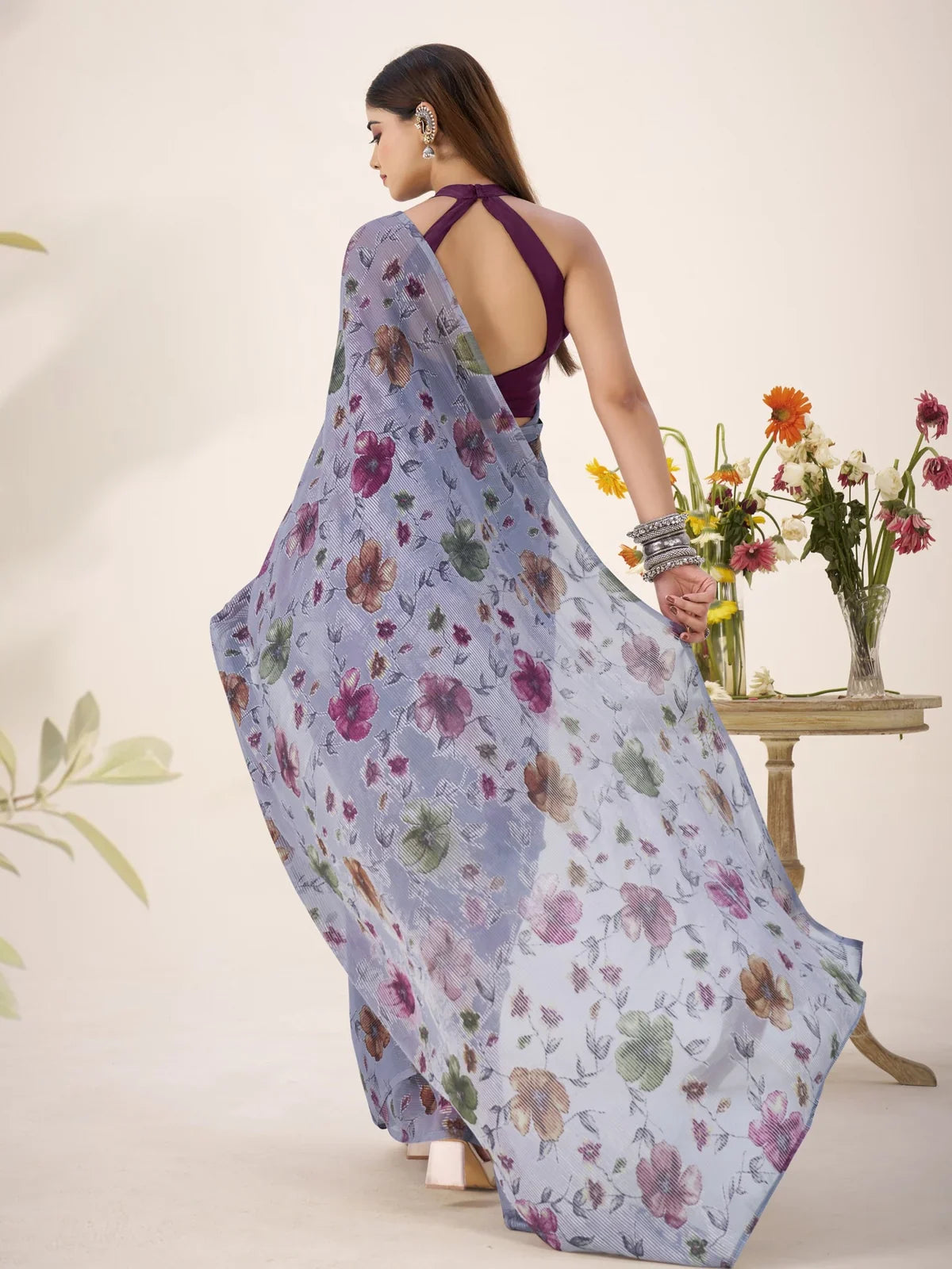 Tarani back view of blue Lurex Brasso saree with natural drape and elegant finish