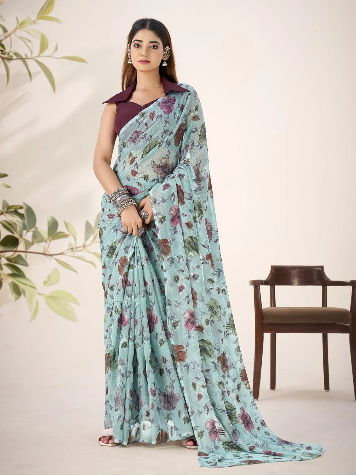 Tarani light blue floral Lurex Brasso saree with wine blouse in full front view