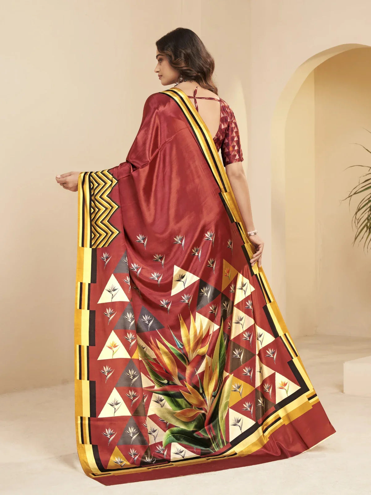 Back view of Tarani maroon soft silk saree with floral pallu and stylish blouse