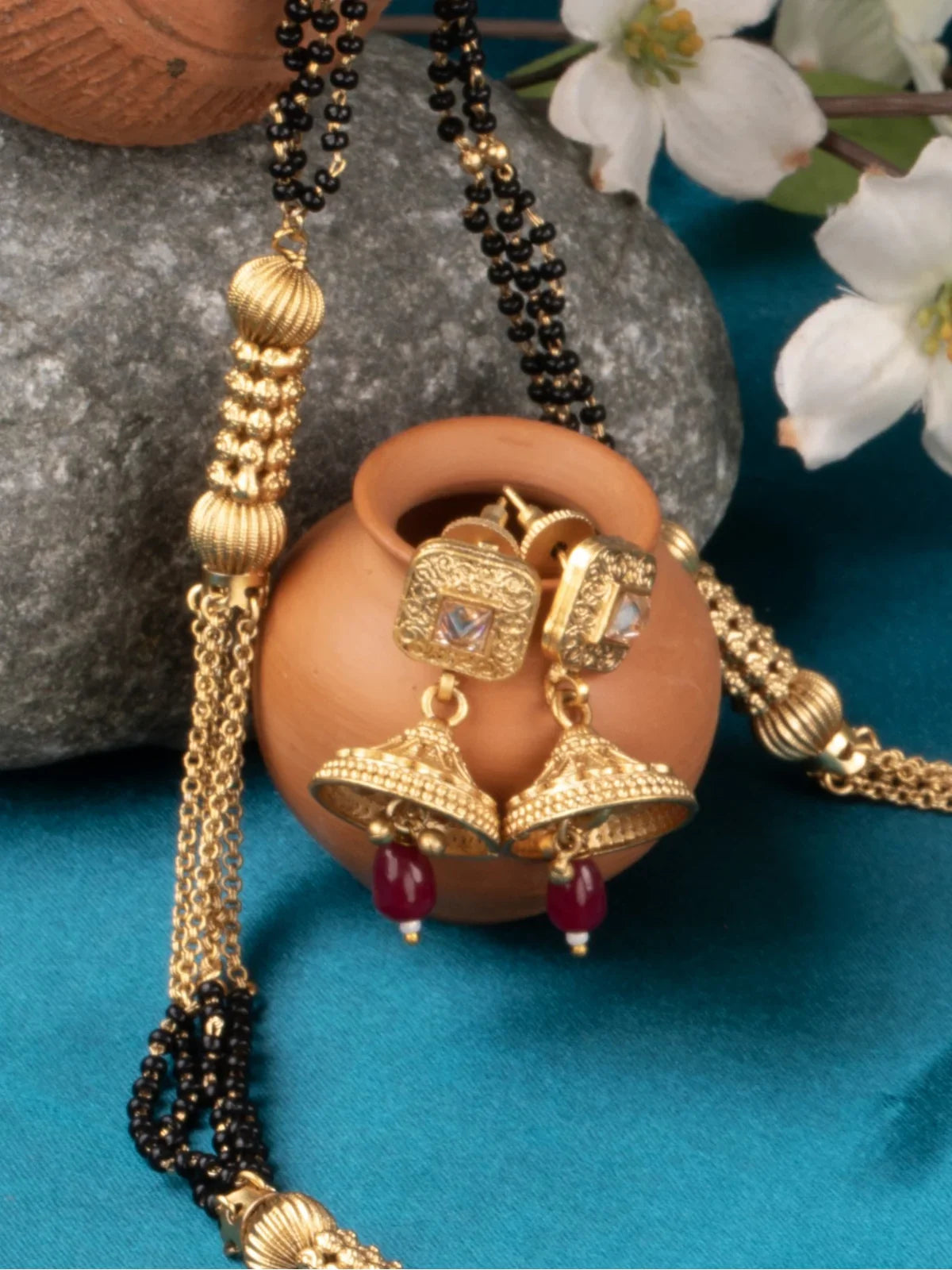 Tarani mangalsutra with matching jhumka earrings set for weddings and festive occasions
