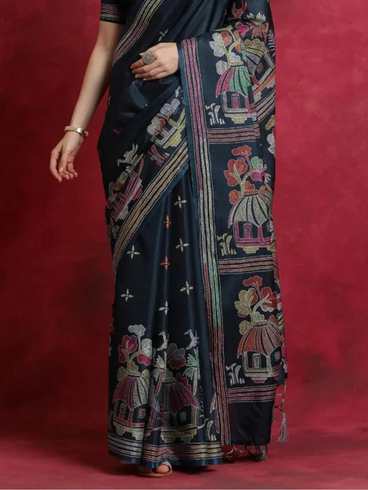 Tarani teal blue Manipuri silk saree pallu view with tassels and woven detailing
